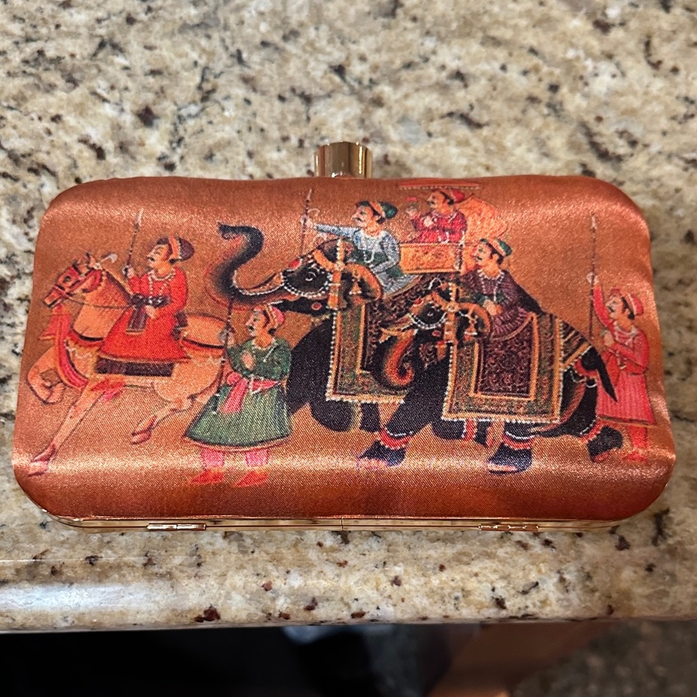 Elegant Orange Clutch with Traditional Artwork
